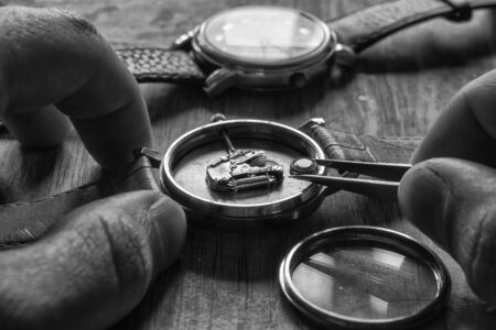 Replacing the watch battery, watchmaker's workshop, close up