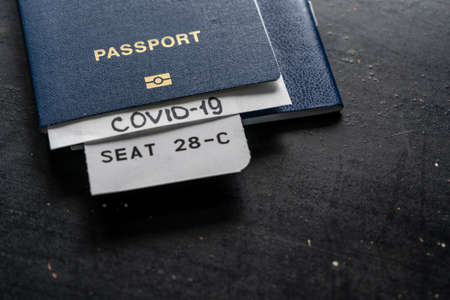 Passport with a diagnosis of covert 19, traveling during a pandemicの写真素材