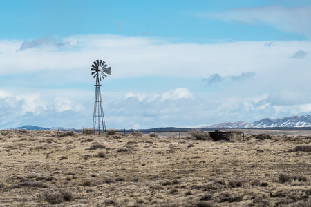 Windmill and Water Tank in Eastern Utahの写真素材