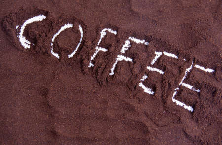 picture of ground coffee and the word coffeeの写真素材