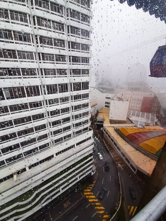View of cable car to Genting highland with the water dropped on the glass in Kuala Lumpur Malaysiaの写真素材