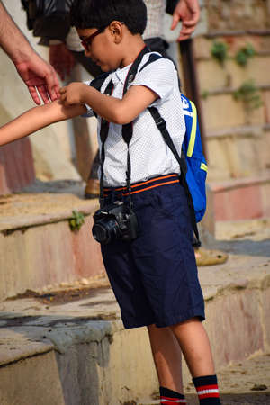 New Delhi, India - March 04, 2020: Children with Indian traditions during morning time at Yamuna river ghat in New Deli, India, Yamuna Ghat Viewのeditorial素材