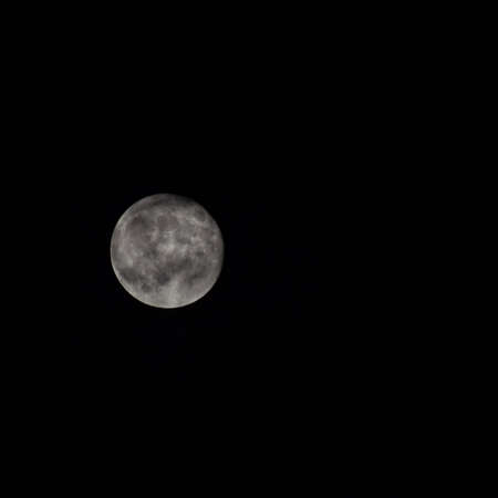 Full moon in the night sky, Great super moon in sky during the dark nightの写真素材