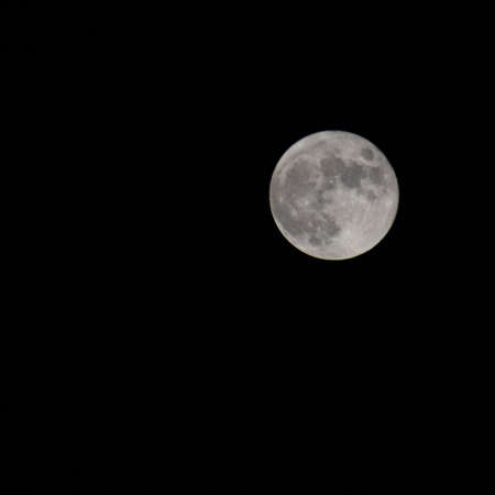 Full moon in the night sky, Great super moon in sky during the night timeの写真素材
