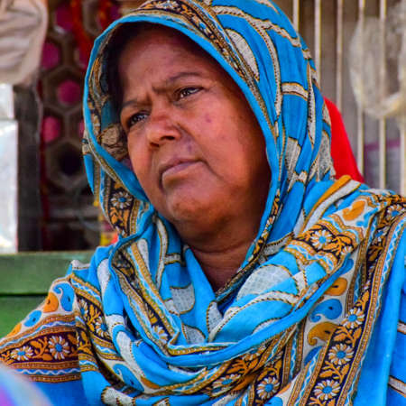 New Delhi India â March 13 2020 : Man Inside Hazrat Nizamuddin Dargah during the day time in Delhi India, Religious Darah of Nizamuddin in Delhi during EID festivalのeditorial素材