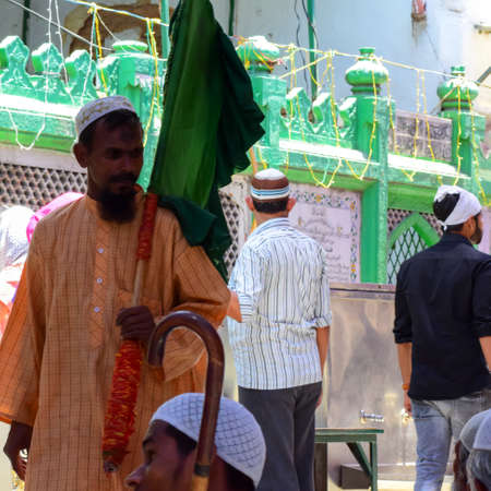 New Delhi India â March 13 2020 : Man Inside Hazrat Nizamuddin Dargah during the day time in Delhi India, Religious Darah of Nizamuddin in Delhi during EID festivalのeditorial素材