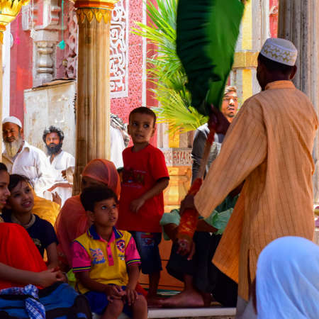 New Delhi India â March 13 2020 : Man Inside Hazrat Nizamuddin Dargah during the day time in Delhi India, Religious Darah of Nizamuddin in Delhi during EID festivalのeditorial素材