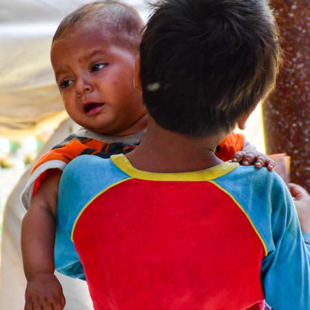 New Delhi India â March 13 2020 : Child Inside Hazrat Nizamuddin Dargah during the day time in Delhi India, Religious Darah of Nizamuddin in Delhi during EID festivalのeditorial素材