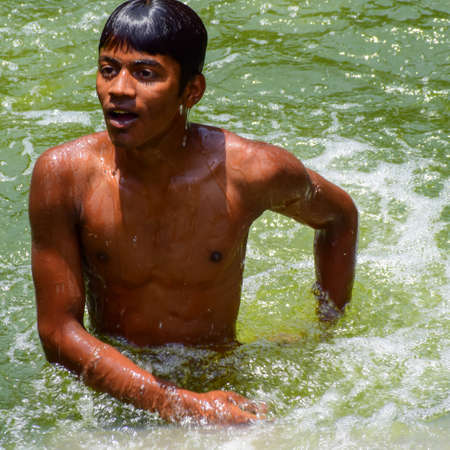New Delhi India â March 13 2020 : Child Inside Hazrat Nizamuddin Dargah during the day time in Delhi India, Religious Darah of Nizamuddin in Delhi during EID festivalのeditorial素材