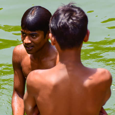 New Delhi India â March 13 2020 : Child Inside Hazrat Nizamuddin Dargah during the day time in Delhi India, Religious Darah of Nizamuddin in Delhi during EID festivalのeditorial素材