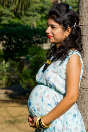 New Delhi India â March 3 2020 : Maternity shoot pose for welcoming new born baby in Lodhi Road in Delhi India, Maternity photo shoot done by parents for welcoming their childのeditorial素材