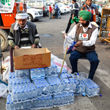 New Delhi, India â December 25 2020 : Indian Sikh and Hindu Farmers from Punjab, Uttar Pradesh and Uttarakhand states protests at Delhi-UP Border. Farmers are protesting against the new farmer lawsのeditorial素材