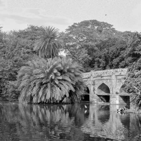 Mughal Architecture inside Lodhi Gardens, Delhi, India, Arches Inside the The Three-domed mosque in Lodhi Gardens is said to be the Friday mosque for Friday congregationsのeditorial素材