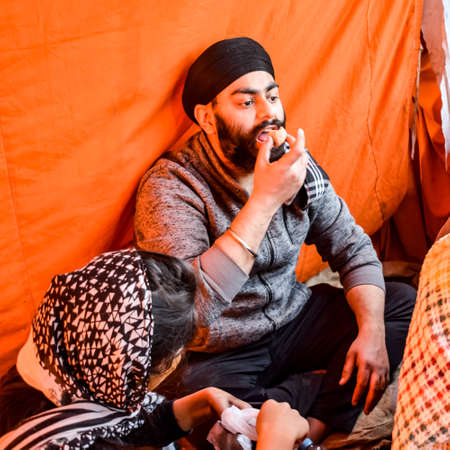 Gazipur, Delhi, India â December 25 2020 : Indian Sikh and Hindu Farmers from Punjab, Uttar Pradesh and Uttarakhand states protests at Delhi-UP Border. Farmers are protesting against new farmer lawsのeditorial素材