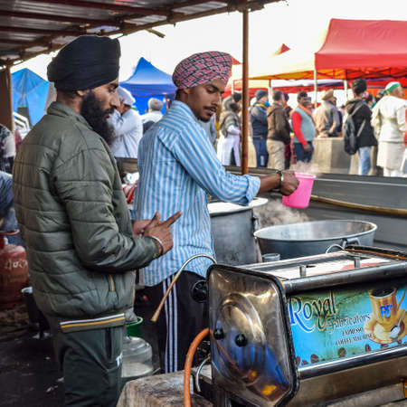 Gazipur, Delhi, India â€“ December 25 2020 : Indian Sikh and Hindu Farmers from Punjab, Uttar...