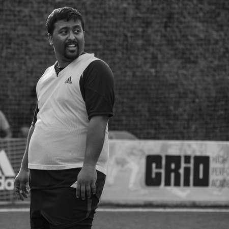 New Delhi, India - July 01 2018: Footballers of local football team during game in regional Derby championship on football pitch. Hot moment of football match on grass field stadium - Black and Whiteのeditorial素材