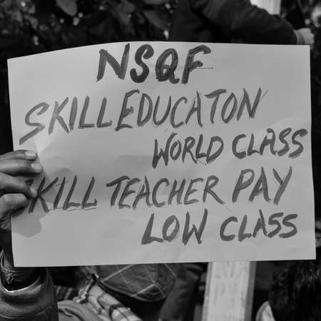 Delhi, India December 25 2021 : Delhi Contractual Guest Teachers with posters, flags and...