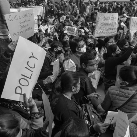 Delhi, India December 25 2021 : Delhi Contractual Guest Teachers with posters, flags and...