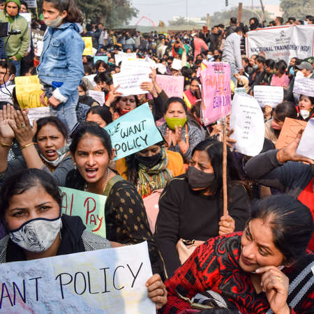 New Delhi, India December 25 2021 : Delhi Contractual Guest Teachers with posters, flags and graffitiâs protesting against Delhi AAP Government for making policy, Delhi Guest Teachers protestingのeditorial素材