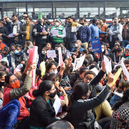 New Delhi, India December 25 2021 : Delhi Contractual Guest Teachers with posters, flags and graffitiâs protesting against Delhi AAP Government for making policy, Delhi Guest Teachers protestingのeditorial素材