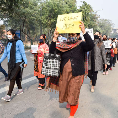 New Delhi, India December 25 2021 : Delhi Contractual Guest Teachers with posters, flags and graffitiâs protesting against Delhi AAP Government for making policy, Delhi Guest Teachers protestingのeditorial素材