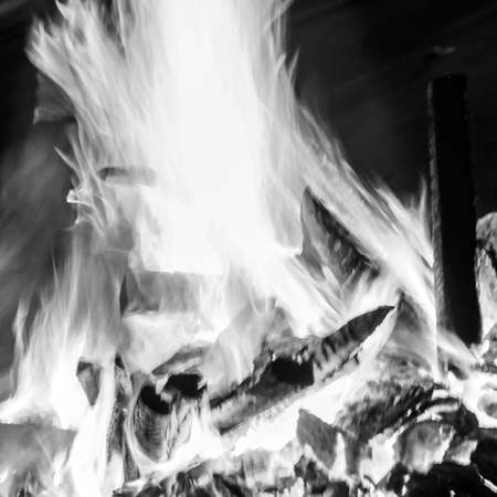 Fire flames on black background, Blaze fire flame texture background, Beautifully, the fire is burning, Fire flames with wood and cow dung bonfire Black and Whiteの写真素材