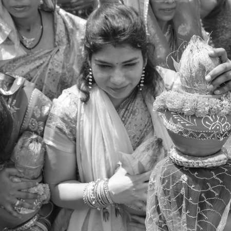 Delhi, India April 03 2022 - Women with Kalash on head during Jagannath Temple Mangal Kalash Yatra,...
