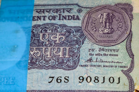 Old One Rupee notes combined on the table, India money on the rotating table. Old Indian Currency...