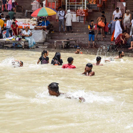 Garh Mukteshwar, Uttar Pradesh, India - June 11 2022 - People are taking holy dip on the occasion of Nirjala Ekadashi, A view of Garh Ganga ghat which is very famous religious place for Hindusのeditorial素材