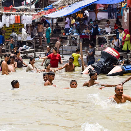 Garh Mukteshwar, Uttar Pradesh, India - June 11 2022 - People are taking holy dip on the occasion of Nirjala Ekadashi, A view of Garh Ganga ghat which is very famous religious place for Hindusのeditorial素材