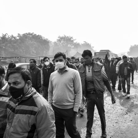 Delhi, India December 25 2021 : Delhi Contractual Guest Teachers with posters, flags and graffitiâs protesting against Delhi AAP Government for making policy, Delhi Teacher protesting Black and Whiteのeditorial素材