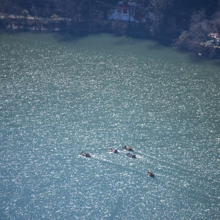 Full view of Naini Lake during evening time near Mall Road in Nainital, Uttarakhand, India,...