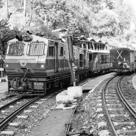 Toy Train moving on mountain slope, beautiful view, one side mountain, one side valley moving on...