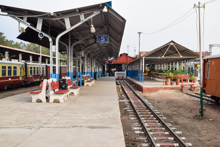 View of Toy train Railway Tracks from the middle during daytime near Kalka railway station in India, Toy train track view, Indian Railway junction, Heavy industryの写真素材