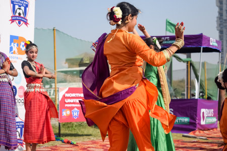 New Delhi, India - July 01 2023 - Bharathanatyam Indian classical odissi dancers performing at stage. Beautiful Indian girl dancers in the posture of Indian dance. Indian classical dance Bharatanatyamのeditorial素材
