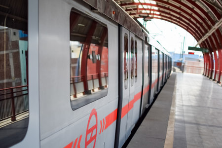 New Delhi India â August 10 2023 - Delhi Metro train arriving at Jhandewalan metro station in New Delhi, India, Asia, Public Metro departing from Jhandewalan stationのeditorial素材