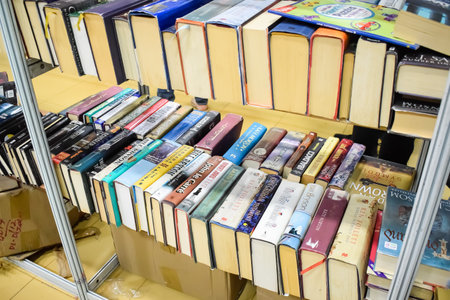 New Delhi, India, September 09 2023 - Variety of Books on shelf inside a book-stall at Delhi...