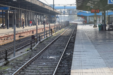 Amritsar, India, April 20 2023 - Indian railway train at Amritsar railway station platform during morning time, Colourful train at Amritsar, Punjab railway stationのeditorial素材