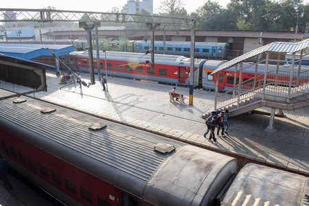 Amritsar, India, April 20 2023 - Indian railway train at Amritsar railway station platform during morning time, Colourful train at Amritsar, Punjab railway stationのeditorial素材