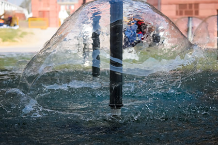 Fountain in the complex of Bharat Mandapam formally known as Pragati Maidan in Delhi India, working fountain in the Bharat Mandapam complex, water in the fountain, fountain in the Bharat Mandapam Parkの写真素材