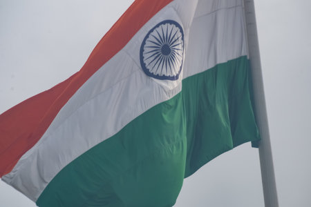 India flag flying high at Connaught Place with pride in blue sky, India flag fluttering, Indian Flag...