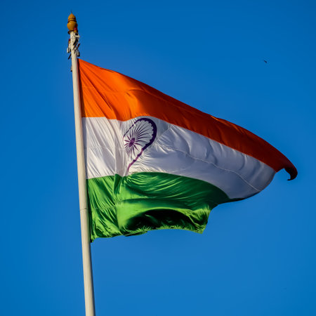 India flag flying high at Connaught Place with pride in blue sky, India flag fluttering, Indian Flag...