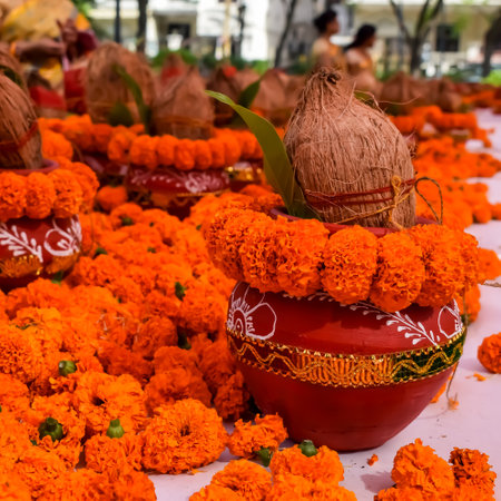 Kalash with coconut and mango leaf with floral decoration earthen pots containing sacred water....