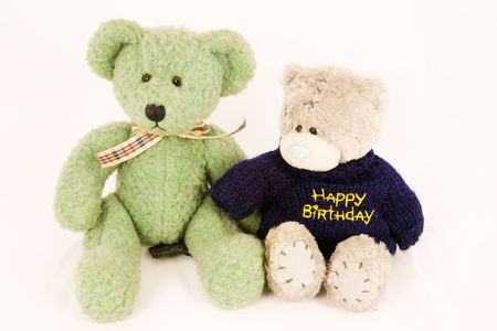 Couple of old fashioned teddy bears, isolated against white backgroundの写真素材