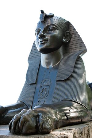 Bronze sphinx statue isolated agaisnt white backgroundの写真素材