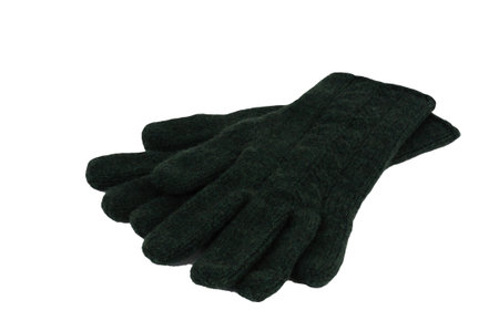 Pair of dark green wool gloves on a white background. Warm handmade knitted items.の写真素材