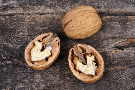 Walnuts on a wooden background. Top view. Healthy food.