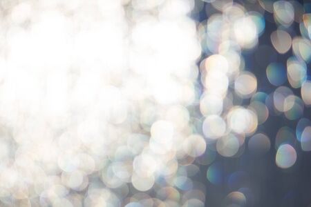 White sunlight shining through textured glassの写真素材