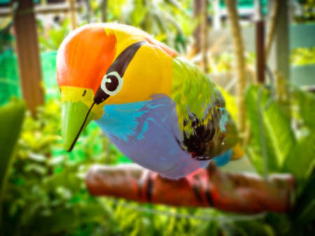 A bird perched on branch の写真素材