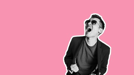 Emotional fashion crazy guy. Funny hipster teen amazed excited expressing lottery winning.